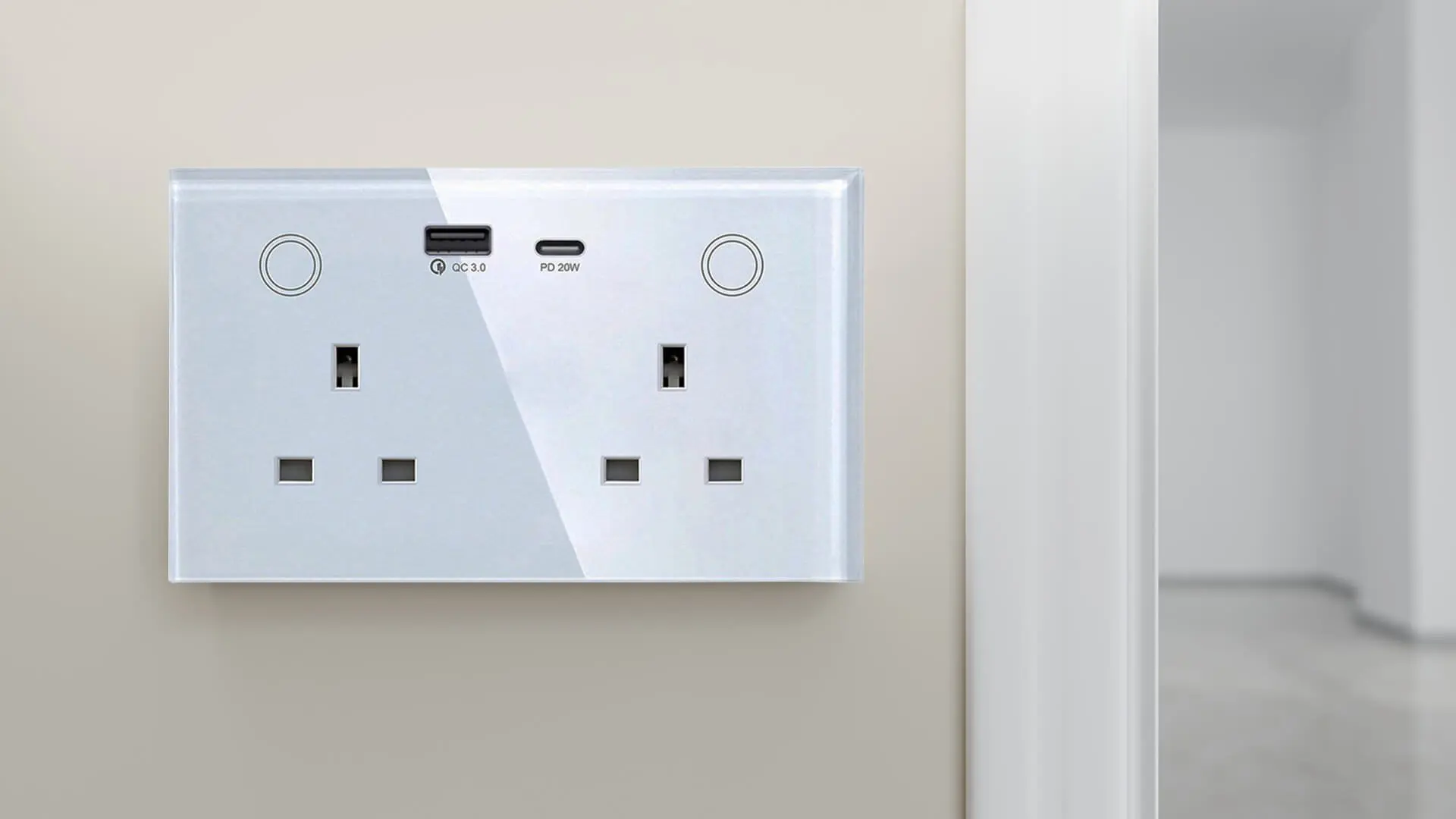 A white wall with two outlets and one usb port.